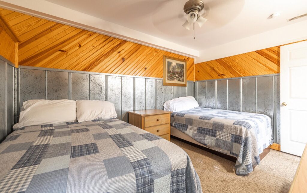 Bedroom of the Chalets at Ozark Outdoors Riverfront Resort