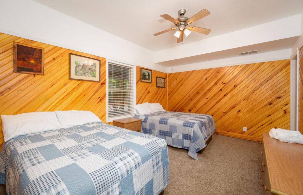 Bedroom of the Chalets at Ozark Outdoors Riverfront Resort