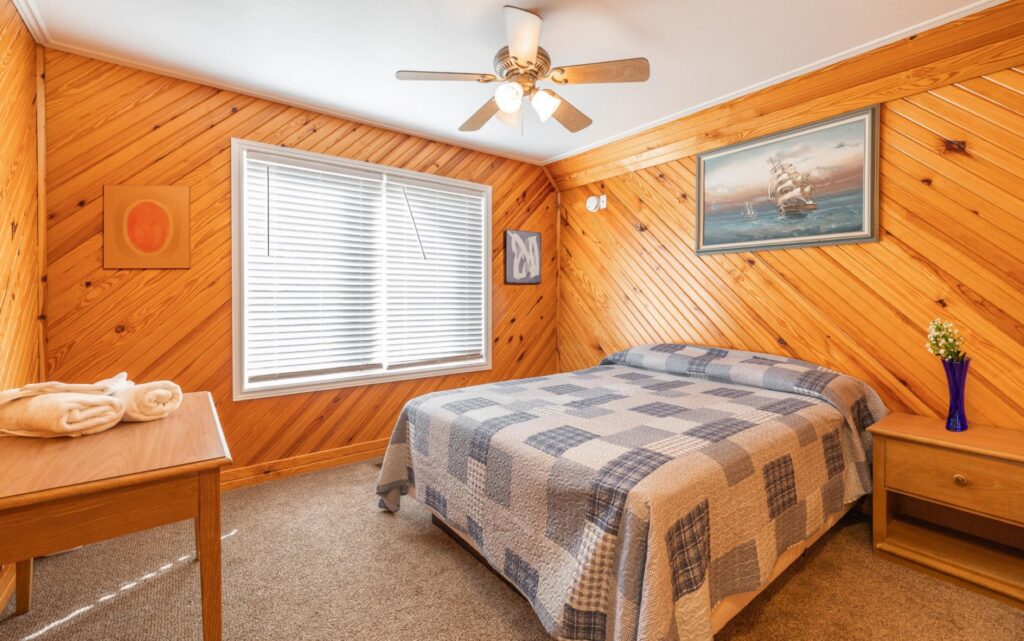 Bedroom of the Chalets at Ozark Outdoors Riverfront Resort