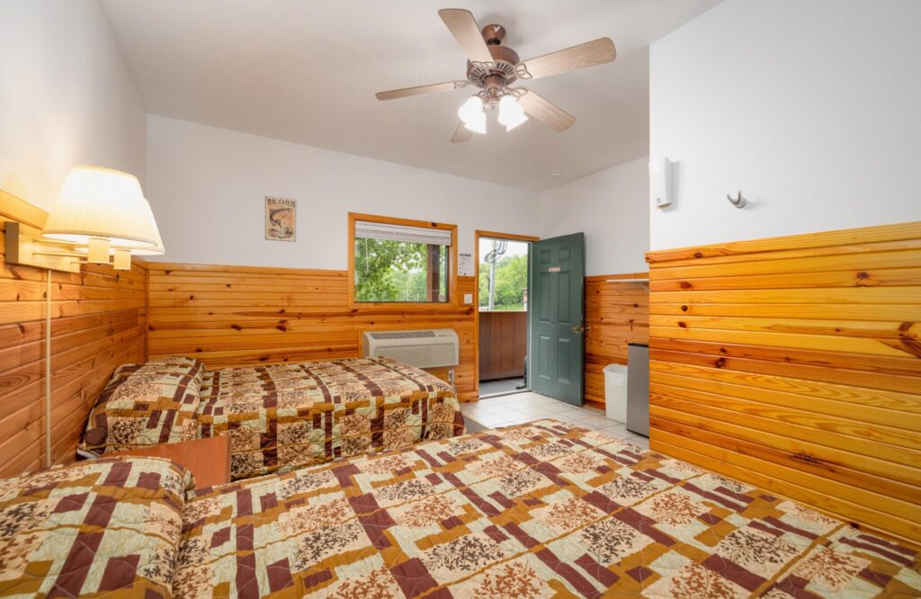 Bedroom of the Do Drift Inn – Motel at Ozark Outdoors Riverfront Resort