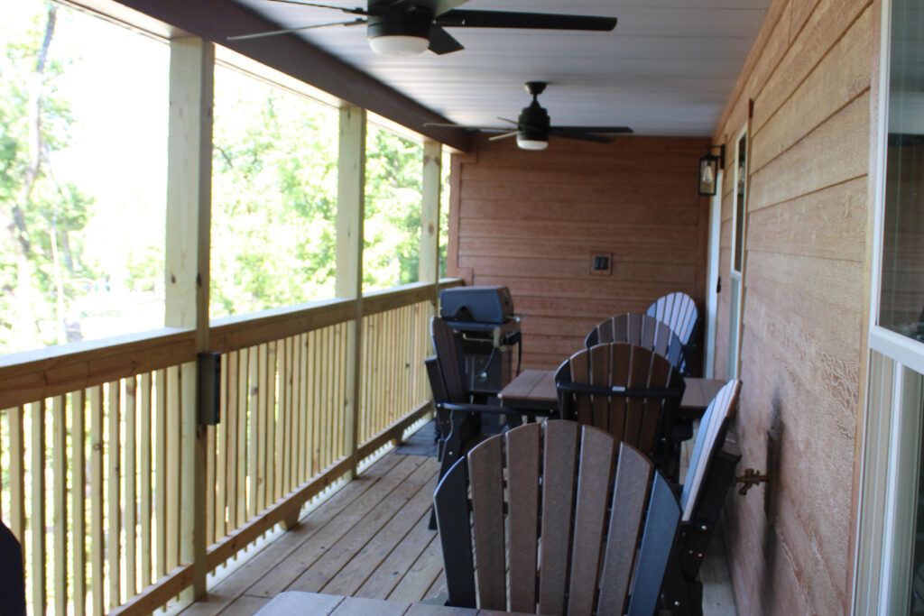 Lookout Lodge covered porch with a grill and seating