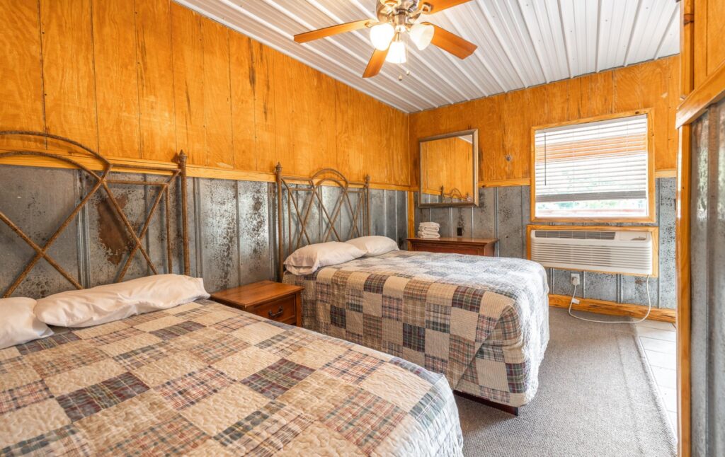 Bedroom of the River’s End – Motel at Ozark Outdoors Riverfront Resort