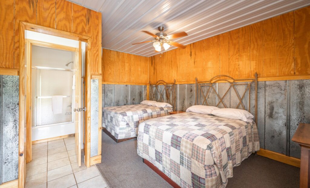 Bedroom of the River’s End – Motel at Ozark Outdoors Riverfront Resort